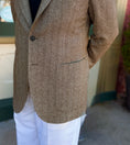 Load image into Gallery viewer, Brown tweed blazer worn with white pants against a neutral background